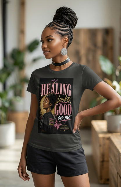 Woman wearing a black t-shirt with a graphic design and text.
