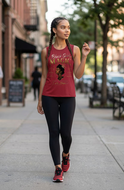 Woman walking on a sidewalk wearing a red tank top with a graphic design and text.