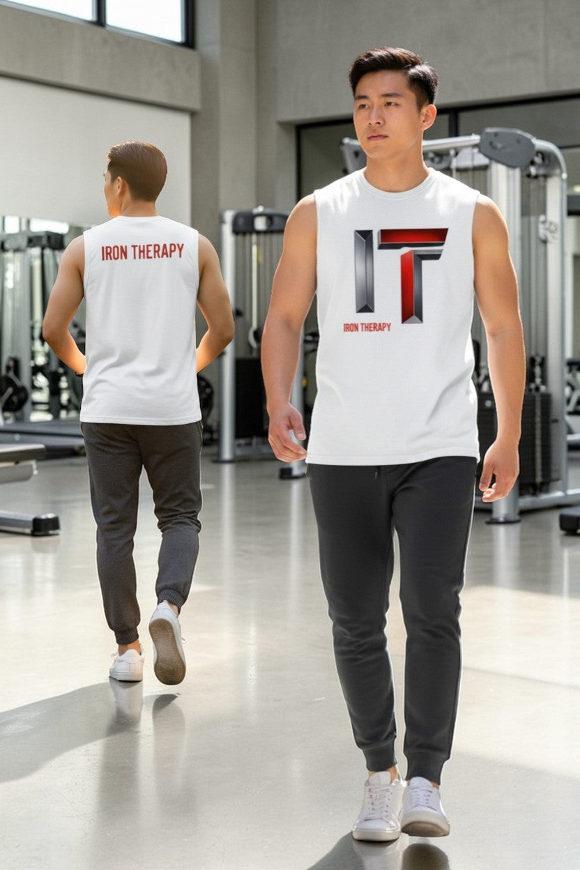 Two individuals wearing 'Iron Therapy' branded sleeveless shirts in a gym setting.