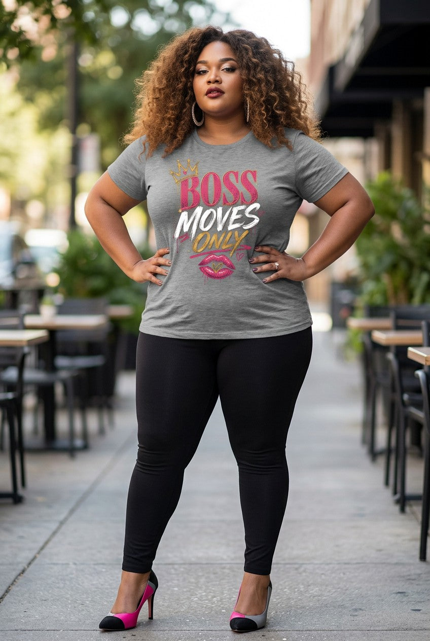 Woman wearing a gray t-shirt with a motivational quote in an outdoor setting