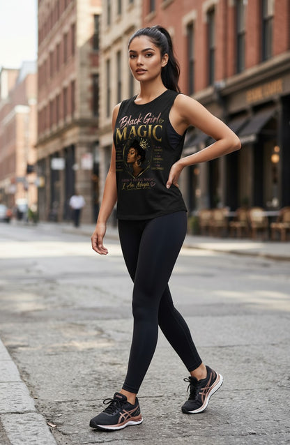 Woman wearing a 'Black Girls Magic' tank top on a city street.