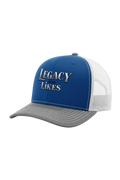 Blue and white cap with 'Legacy Over Likes' text on a white background