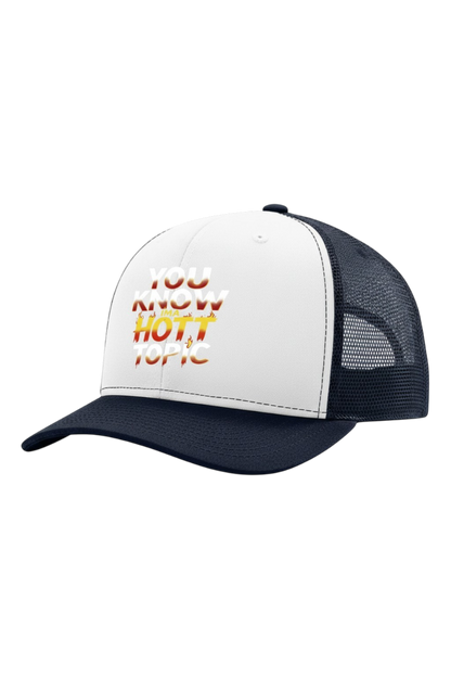 White and navy trucker hat with colorful text on a white background
