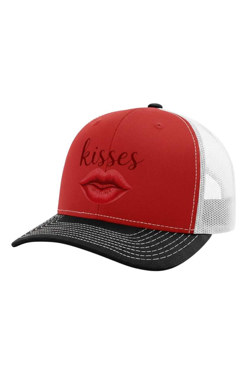 Red and black cap with 'kisses' and a lip design on a white background