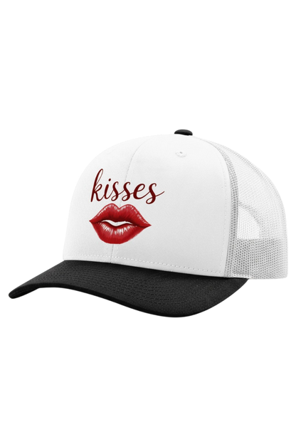 White and black cap with red lips and 'kisses' text on a white background