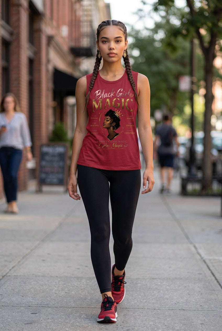 Woman walking on a sidewalk wearing a red tank top with a graphic design and text.