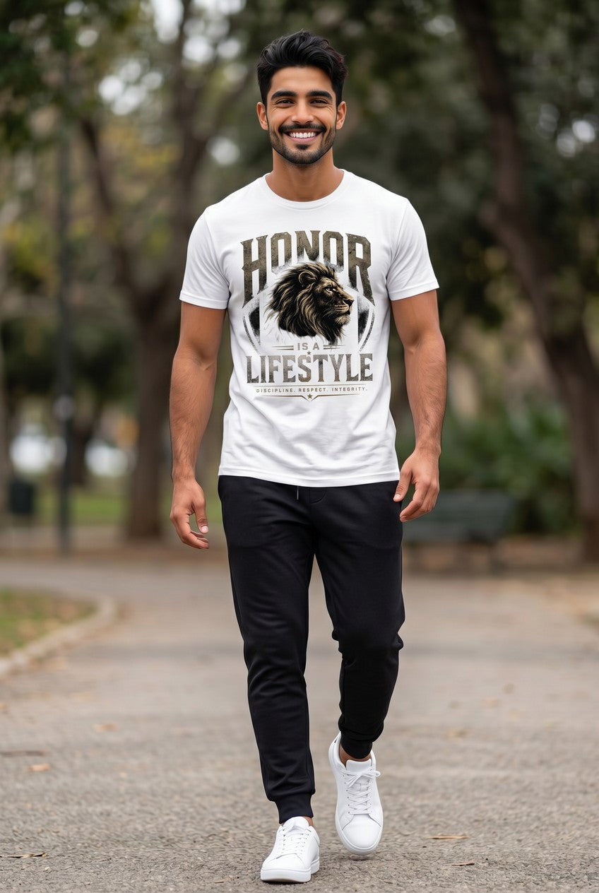 Man wearing a white t-shirt with a lion graphic and text, walking outdoors.