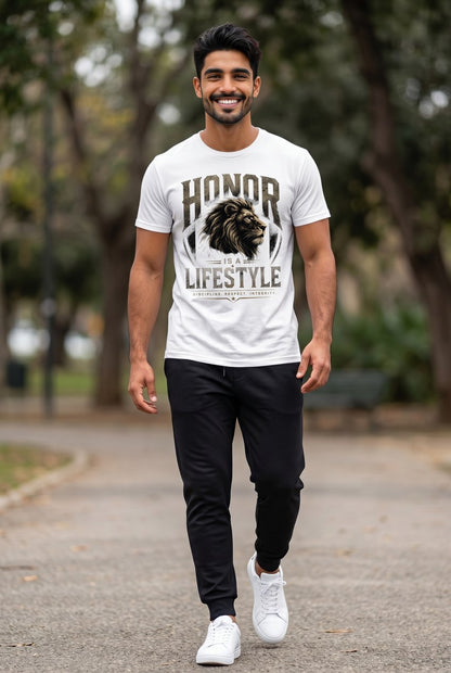 Man wearing a white t-shirt with a lion graphic and text, walking outdoors.