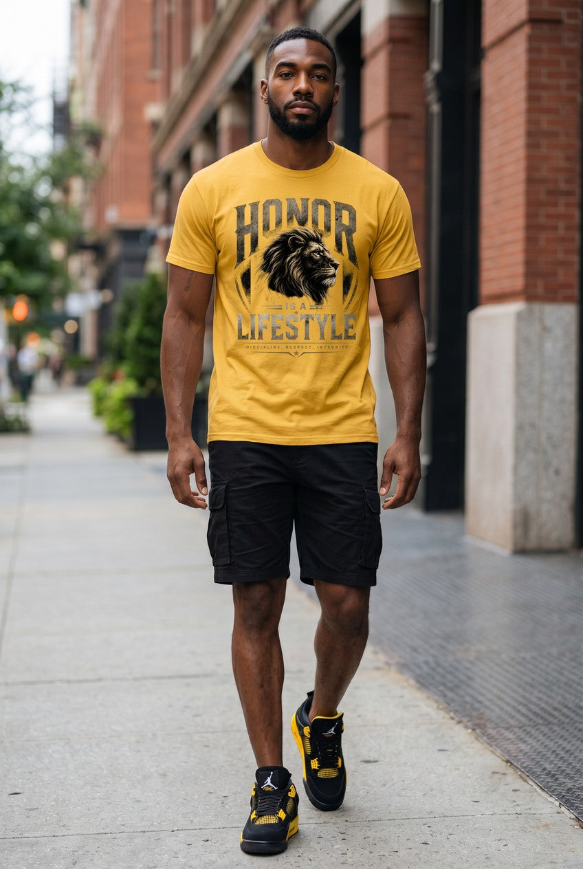 Man wearing a yellow t-shirt with a lion graphic and text, walking on a city street.