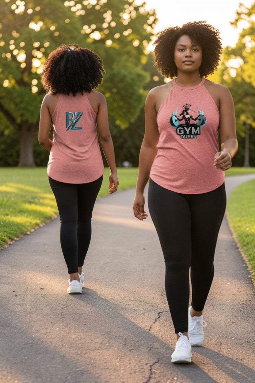 Two women walking outdoors on a path, wearing pink 'GYM' tank tops.