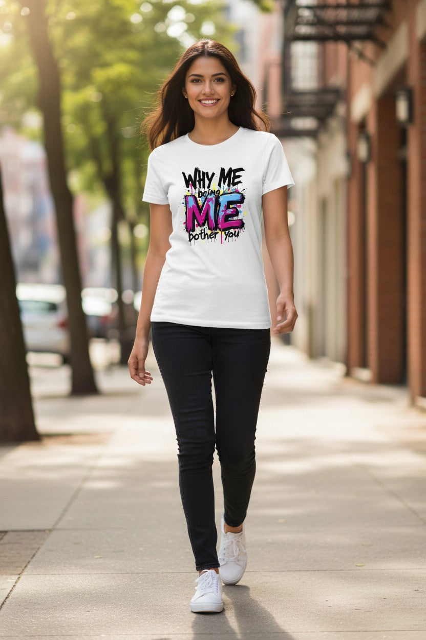 Woman wearing a white t-shirt with colorful text on a city street.