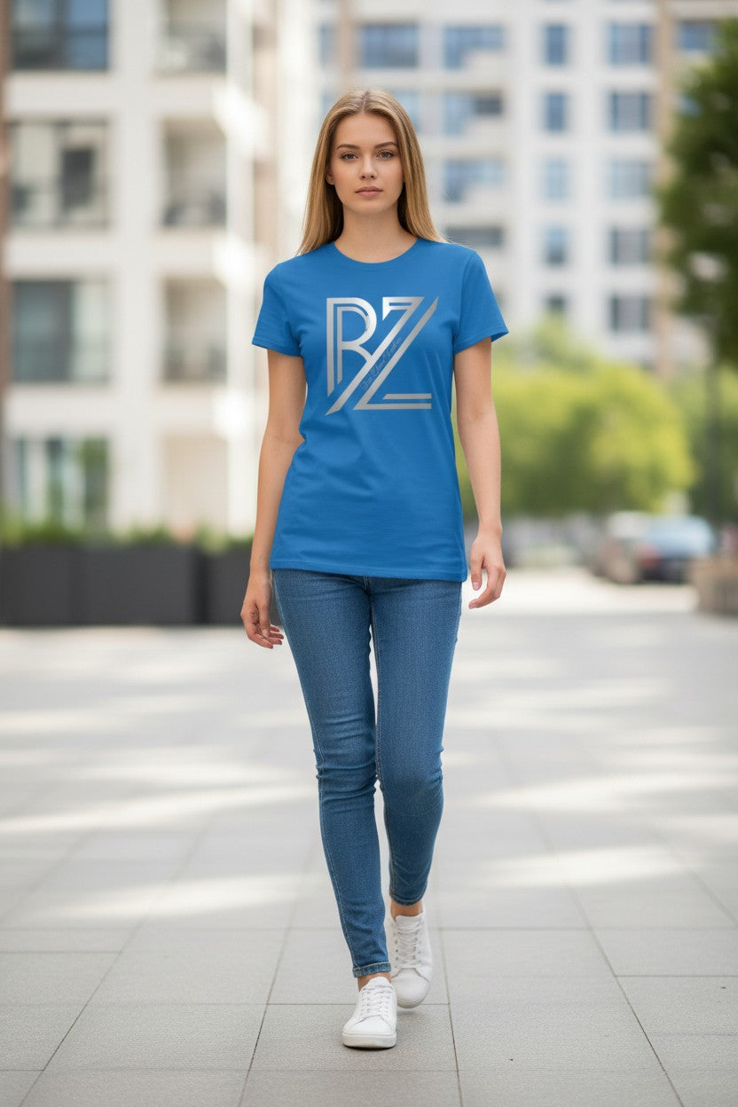 Woman wearing a blue t-shirt with a logo in an urban setting