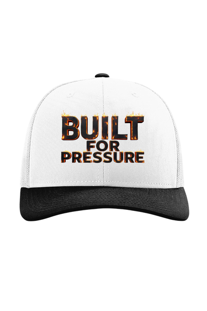 White and black cap with 'Built for Pressure' text on a white background