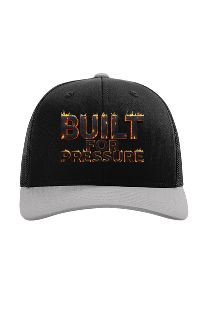 Black and gray cap with 'Built for Pressure' text on a white background