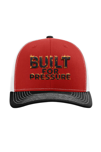 Red and black cap with 'Built for Pressure' text on a white background