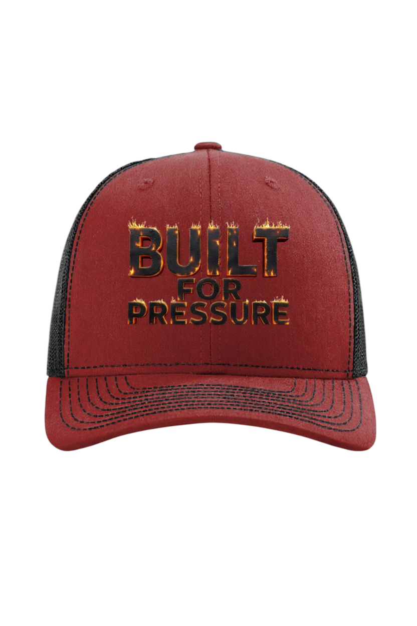 Red and black cap with 'Built for Pressure' text on a white background