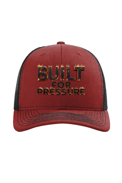Red and black cap with 'Built for Pressure' text on a white background