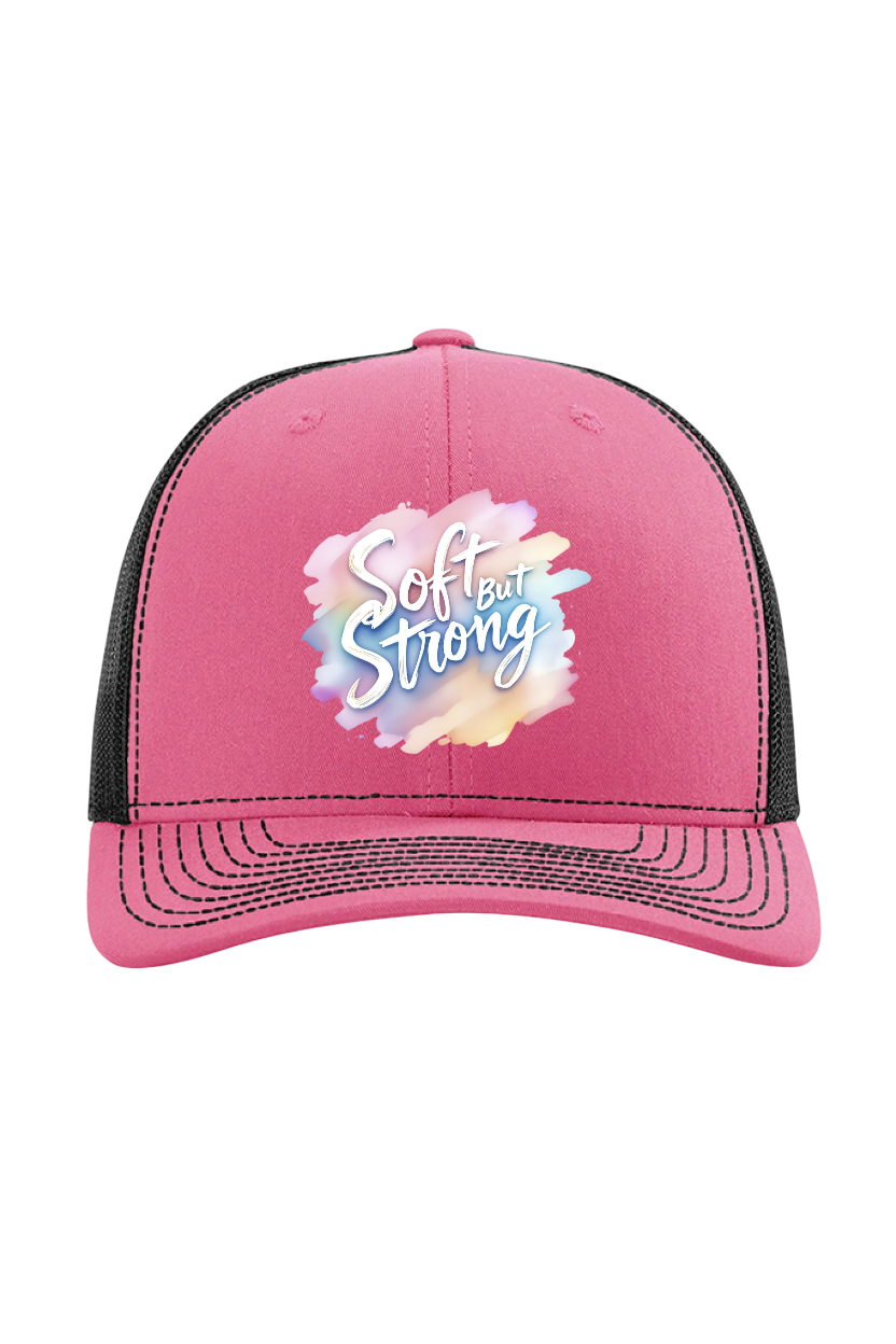 Pink cap with 'Softer Strong' text on a white background