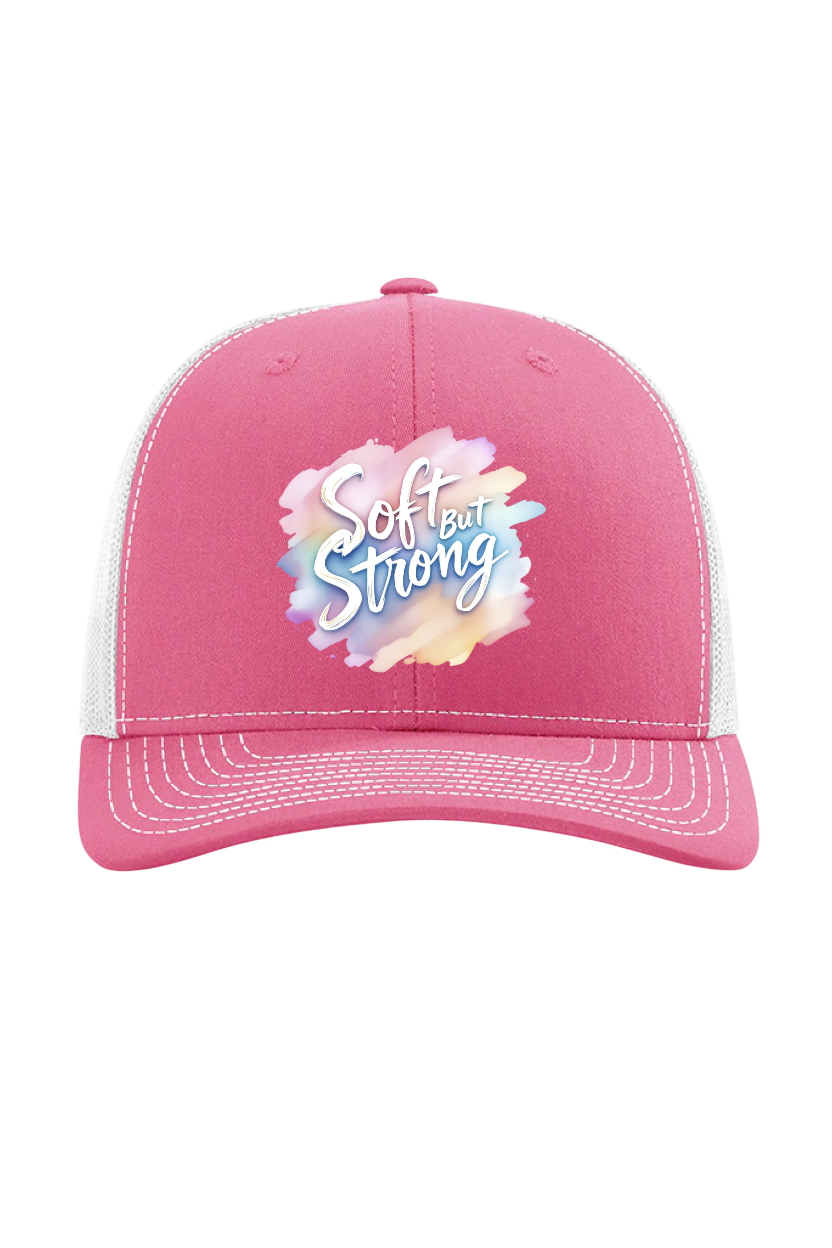 Pink cap with 'Soft and Strong' text on a white background