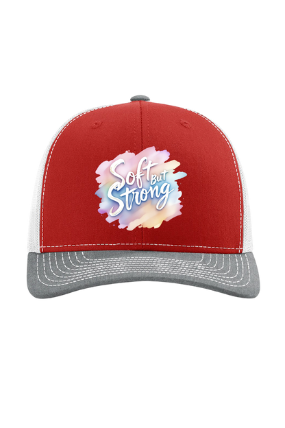 Red and gray cap with 'Soft and Strong' design on a white background