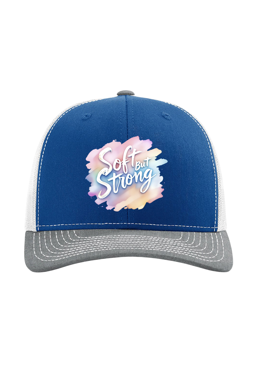 Blue and gray cap with 'Soft but Strong' text on a white background