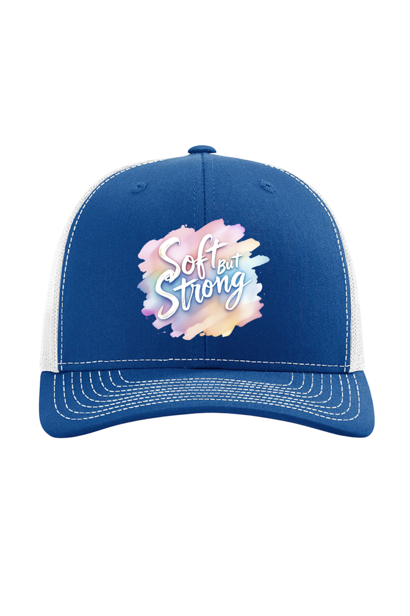 Blue and white cap with 'Soft but Strong' text on a white background