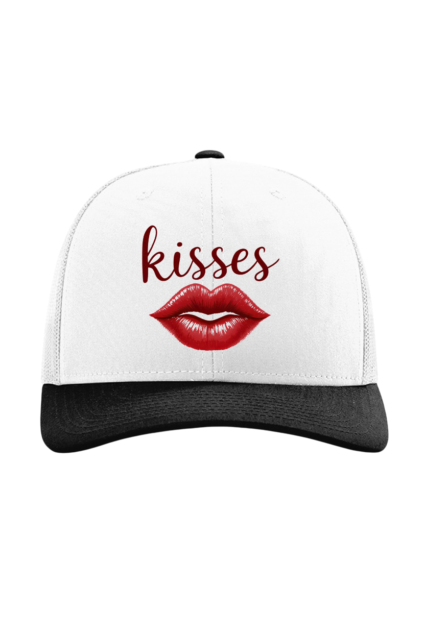 White cap with red lips and 'kisses' text on a white background