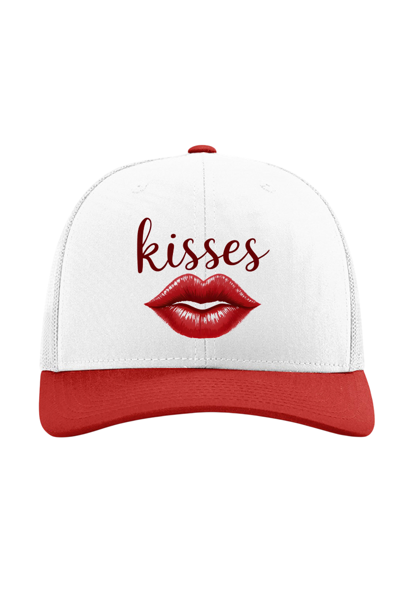 White and red cap with lips and 'kisses' text on a white background