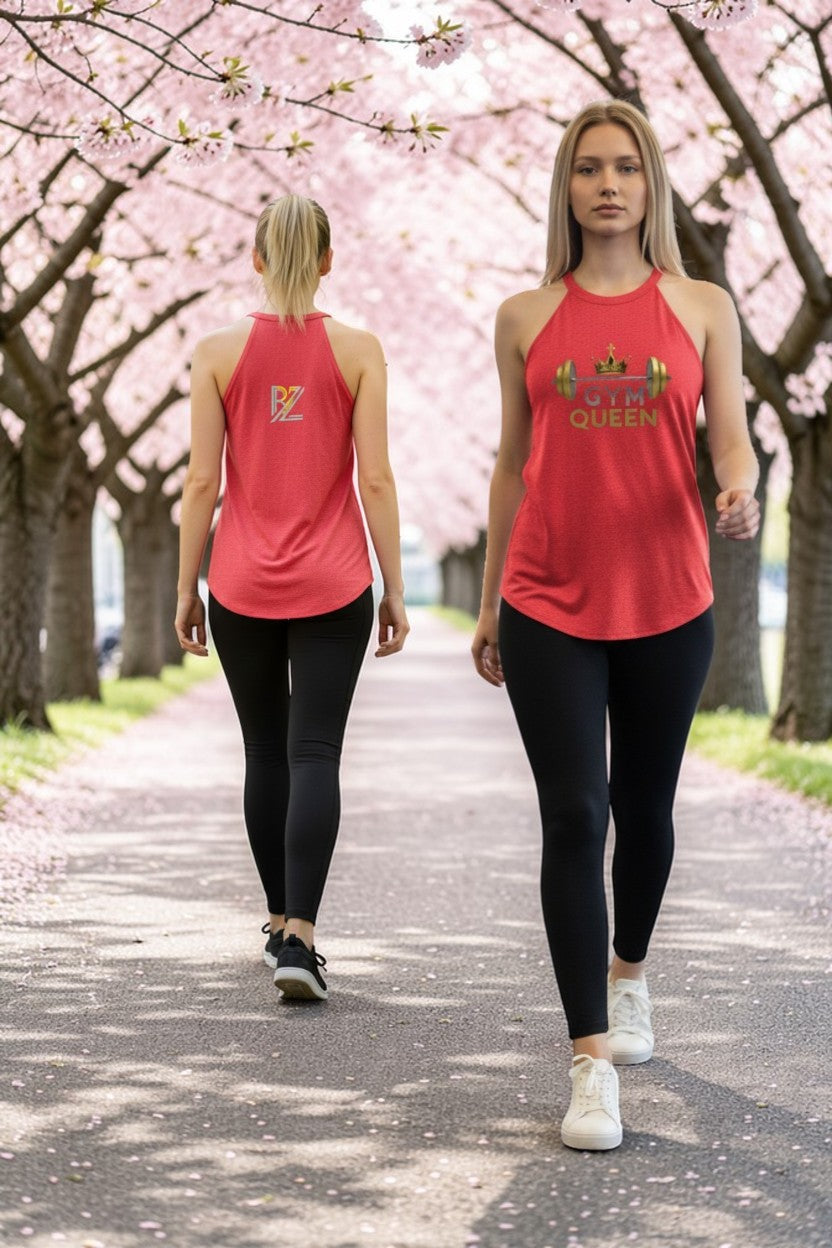 Two women walking on a path with cherry blossom trees in the background