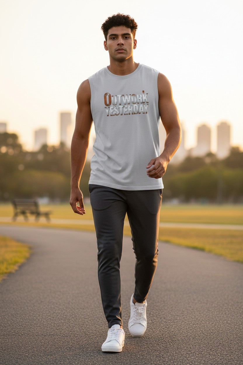 Man walking on a path with a cityscape in the background
