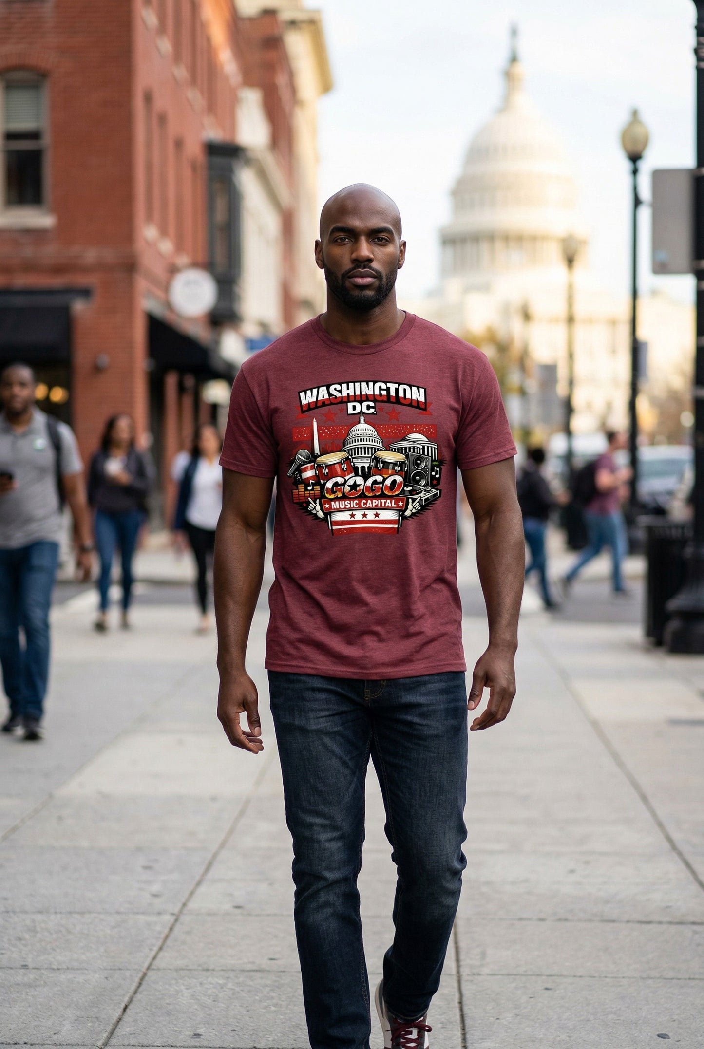 Man wearing a red t-shirt with 'Washington DC' design walking on a city street.