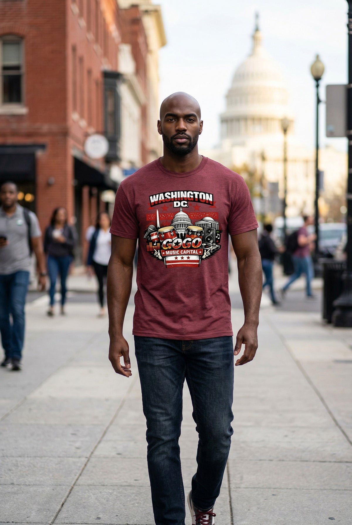 Man wearing a red t-shirt with 'Washington DC' design walking on a city street.