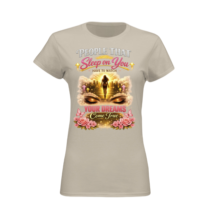 Beige t-shirt with a graphic design and text on a white background
