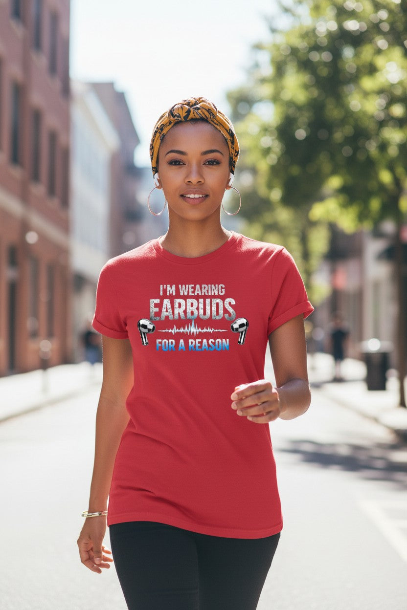 Woman wearing a red t-shirt with text on a city street