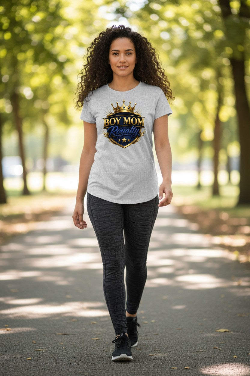 Woman walking outdoors wearing a t-shirt with 'Boy Mom' design