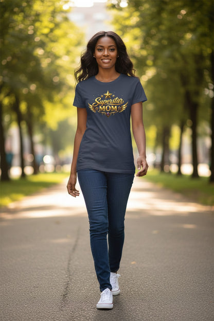 Woman walking outdoors wearing a t-shirt with 'Superstar Mom' text