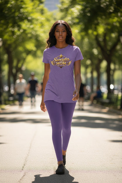 Woman wearing a purple t-shirt and leggings with 'Superstar Mom' text, walking outdoors.