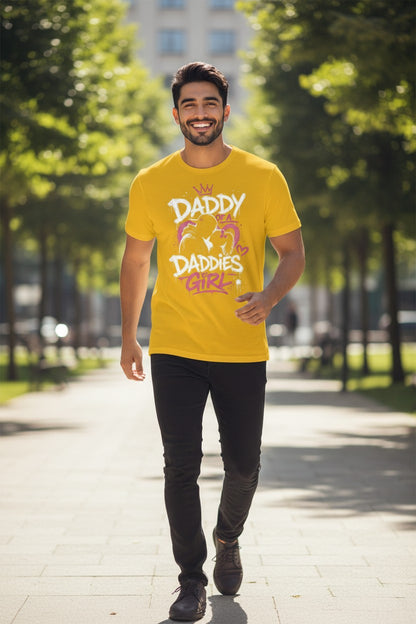 Man wearing a yellow t-shirt with text walking outdoors on a sunny day.