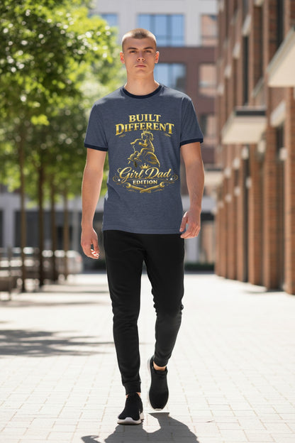 Man wearing a t-shirt with 'Built Different, Girl Dad Edition' text walking outdoors.