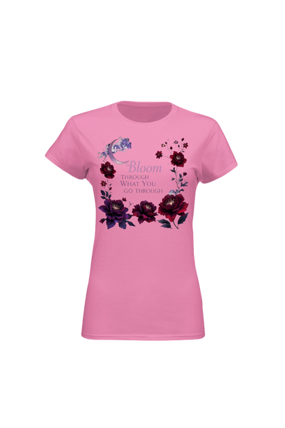 Pink t-shirt with floral design and text on a white background