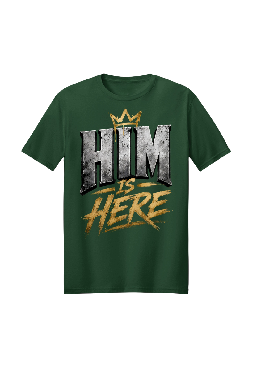Green t-shirt with 'HIM IS HERE' text design on a white background