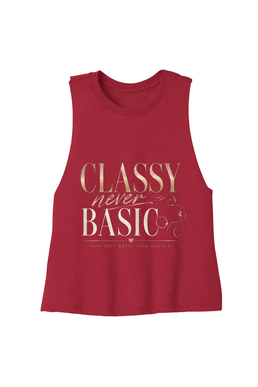A sleeveless red muscle tank top featuring a gold graphic print that reads 'CLASSY never BASIC' with a small illustration of a cat wearing glasses and the phrase 'SHOW THEY WERE THEN AND NOW' underneath.