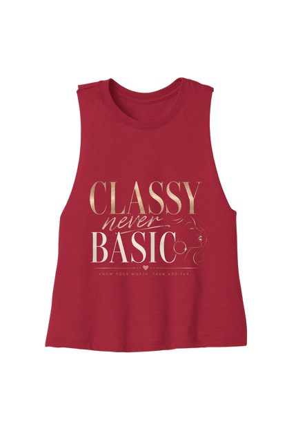 A sleeveless red muscle tank top featuring a gold graphic print that reads 'CLASSY never BASIC' with a small illustration of a cat wearing glasses and the phrase 'SHOW THEY WERE THEN AND NOW' underneath.