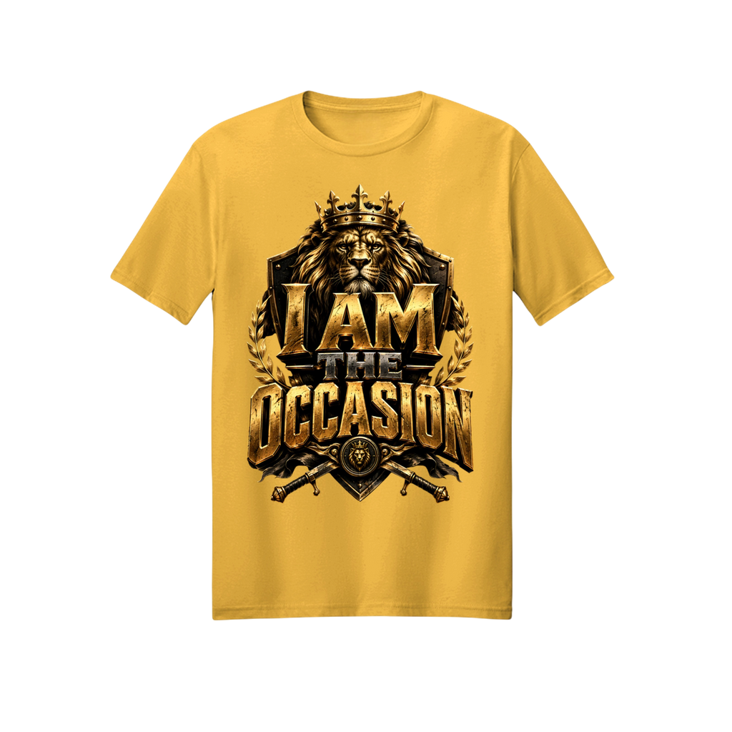 A yellow short-sleeve crewneck t-shirt featuring a large graphic print on the front with a lion wearing a crown and the text 'I AM THE OCCASION' in metallic gold and black.