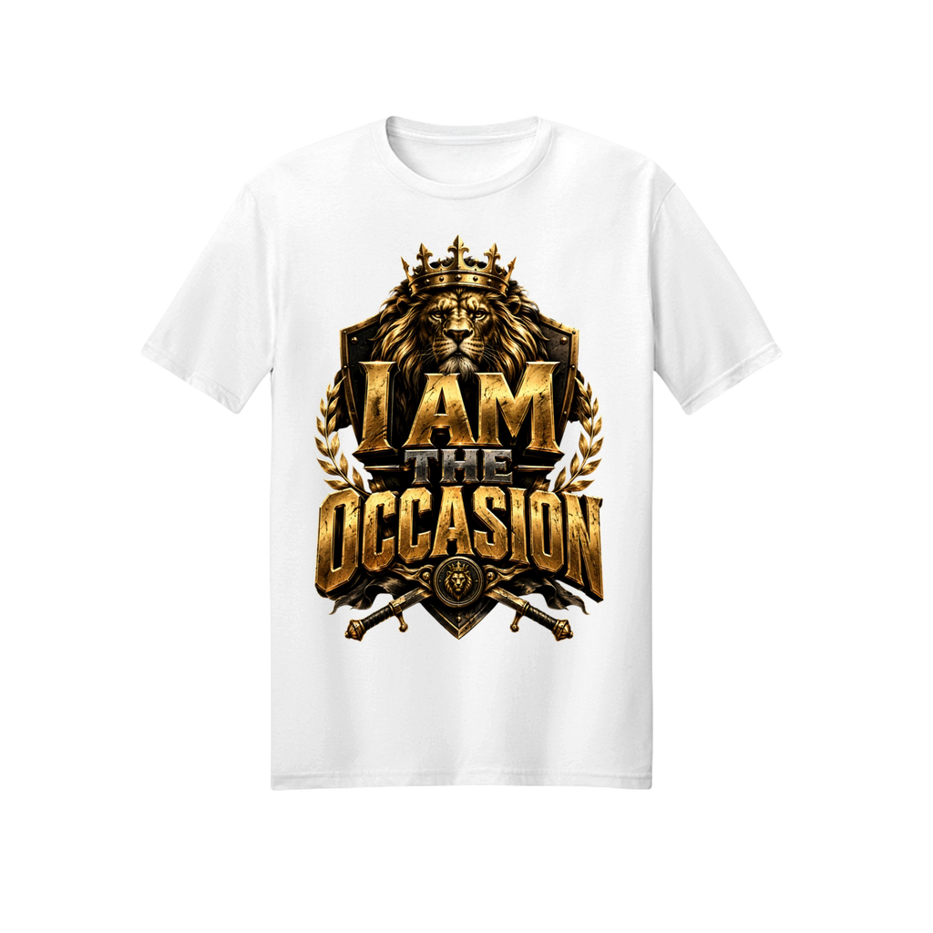 A white short-sleeve crewneck t-shirt featuring a large, detailed graphic on the front. The graphic displays a golden lion wearing a crown, flanked by laurel branches, with the text 'I AM THE OCCASION' in a metallic gold 3D font.