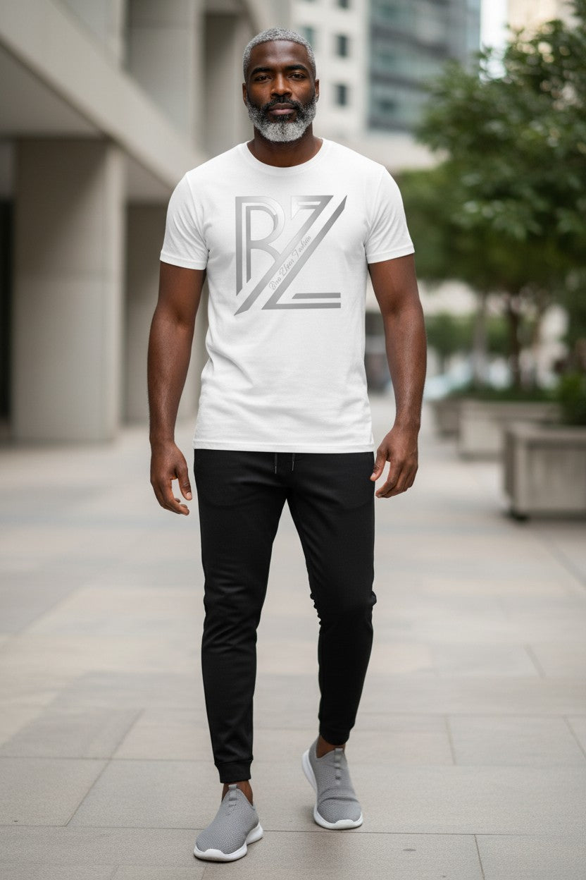 Man wearing a white t-shirt with a logo and black pants in an urban setting