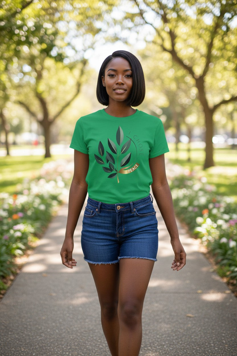 Woman wearing a green t-shirt with a leaf design in a park