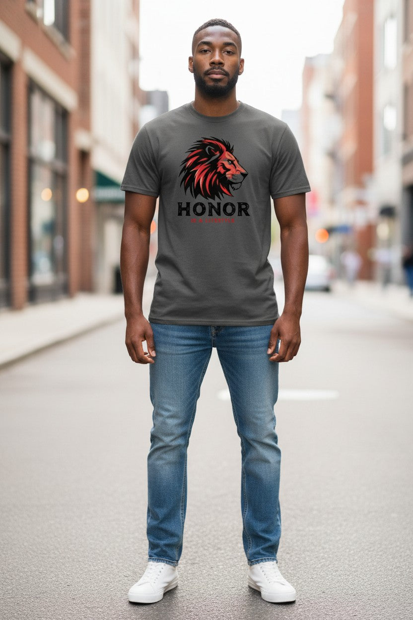Man wearing a gray t-shirt with a lion graphic and 'Honor' text on a city street.
