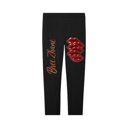 Black leggings with red lip print and 'Bree Zhan' text on a white background