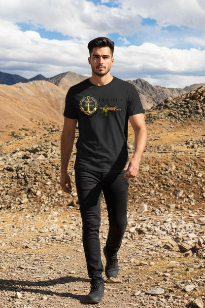 Man wearing a black t-shirt with a graphic design in a desert landscape